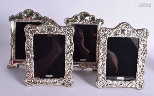 TWO PAIRS OF HALLMARKED SILVER PHOTO FRAMES. Largest 15cm x ...