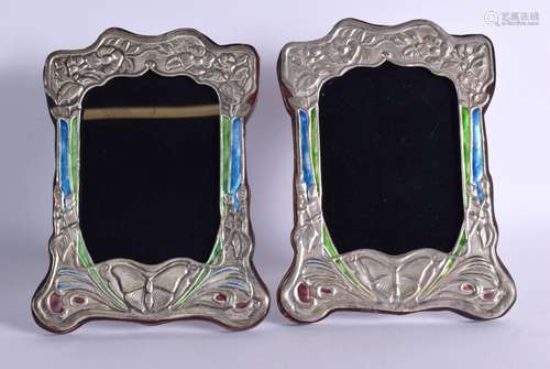 A PAIR OF SILVER AND ENAMEL ARE NOVEAU STYLE PICTURE FRAMES....