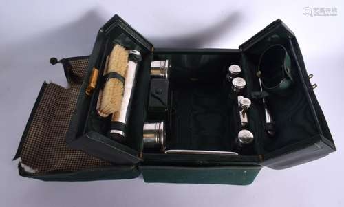 A LATE 19TH CENTURY ASPREYS SILVER TRAVELLING SET. Hallmarke...