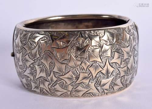 A WHITE METAL BANGLE. Internal 5.5cm x 5cm, weight 48g