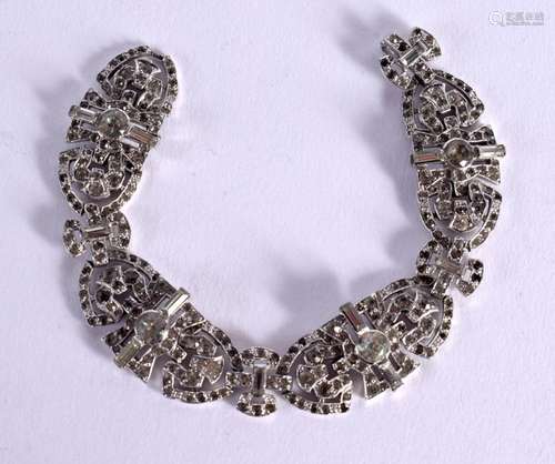 A WHITE METAL AND MARCASITE BRACELET. 18cm long, weight 23.9...