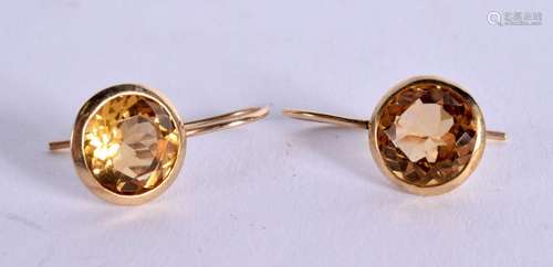 A PAIR OF EDWARDIAN GOLD AND TOPAZ EARRINGS. 2.3cm drop, wei...