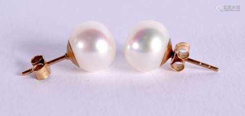 A PAIR OF PEARL EARRINGS. Pearl size 10.5mm, weight 3.4g