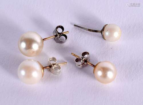 TWO PAIRS OF PEARL EARRINGS. Largest pearl 72mm, total weigh...