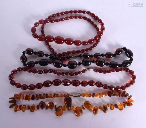 FOUR STRINGS OF AMBER BEADS. Longest 66cm, total weight 126g...