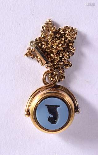 A GOLD INTAGLIO DOUBLE SWIVEL SEAL. Chain 36cm, weight 11.5g