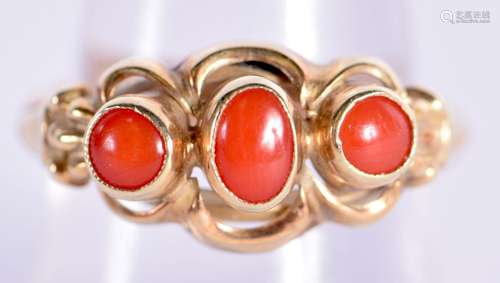 AN 18CT GOLD AND CORAL RING. Size P, weight 4.8g