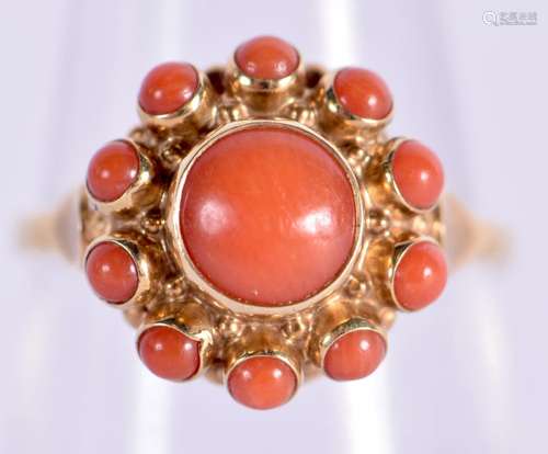 A 14CT GOLD AND CORAL RING. Stamped 14K, Size N, weight 3.2g