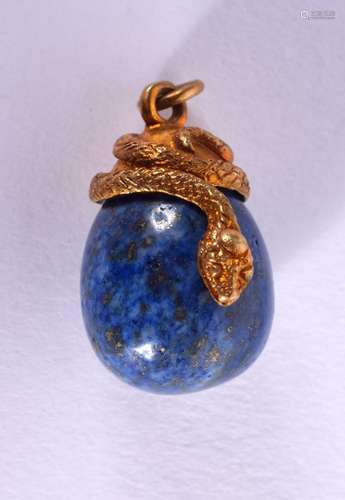 A CONTINENTAL GOLD AND LAPIS PENDANT. Stamped 84, 2.7cm x 2c...