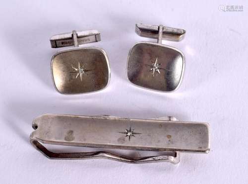 A MATCHING CONTINENTAL SILVER TI CLIP AND CUFFLINKS Stamped ...