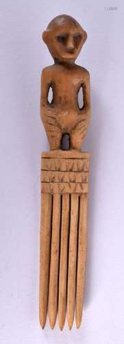 A RARE 19TH CENTURY AFRICAN CARVED BONE TRIBAL COMB formed w...