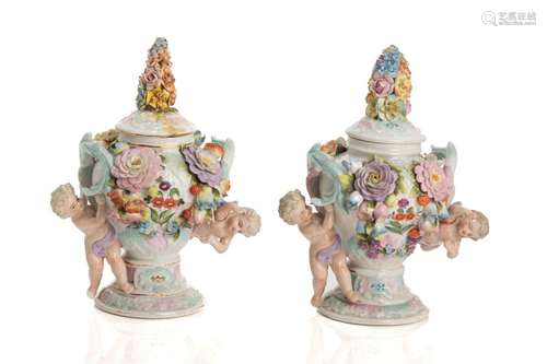 PAIR OF DRESDEN COVERED URNS