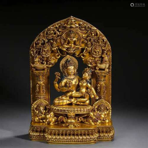 A Tibetan Bronze-gilt Figure of Shiva and Parvati