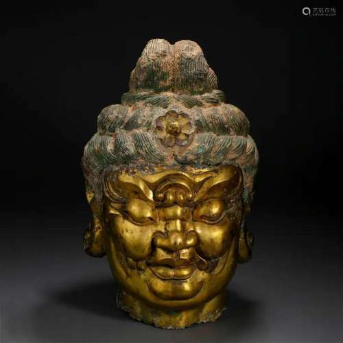 A Tibetan Bronze-gilt Head of Protector