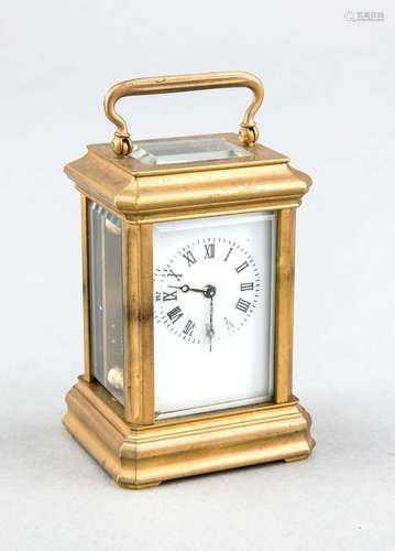 Small travelling clock, brass gilde