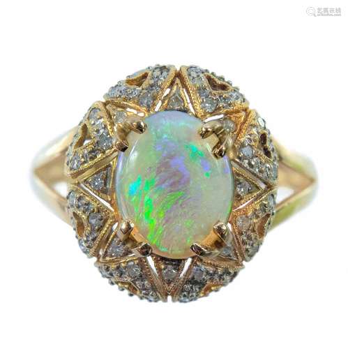 An 18ct gold diamond and white opal dress ring,