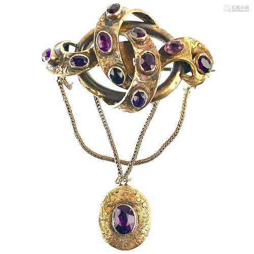 A Victorian gold and amethyst set brooch,