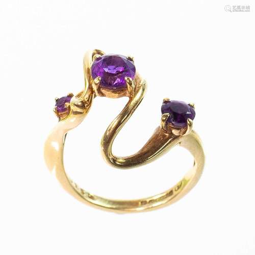 A Bernard Instone 9ct amethyst set three stone ring.