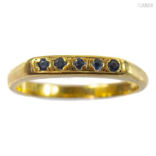 An 18ct gold sapphire set five stone ring.