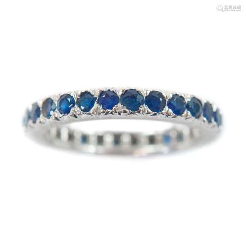 An 18ct white gold sapphire set full eternity ring.