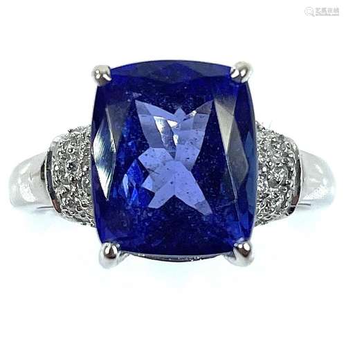 An 18ct white gold Tanzanite and diamond ring.