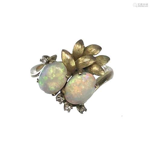 A 14ct gold opal and diamond set six stone ring.