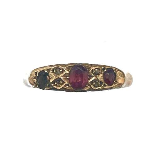 A 9ct rose gold diamond and garnet ring.