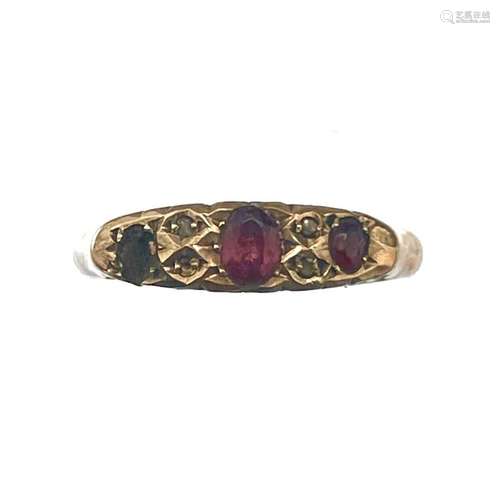 A 9ct rose gold diamond and garnet ring.