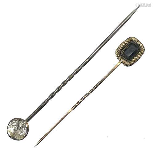 Two 19th century stick pins, one with mourning glazed panel,