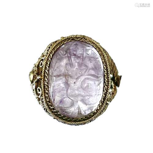 A Chinese silver gilt filigree ring set with an oval amethys...