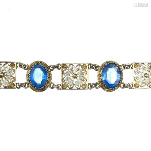 An 800 silver gilt blue stone set bracelet