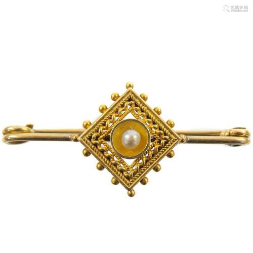 A Victorian gold pearl set pin brooch.