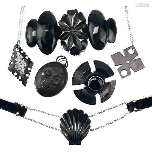 A collection of Whitby Jet jewellery.