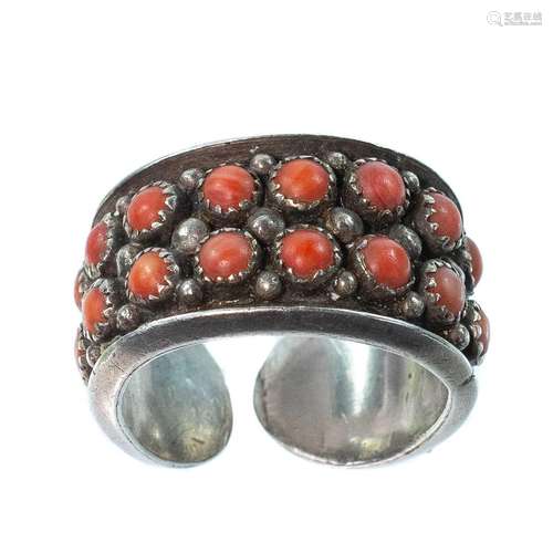 A Navaho silver coral set ring,