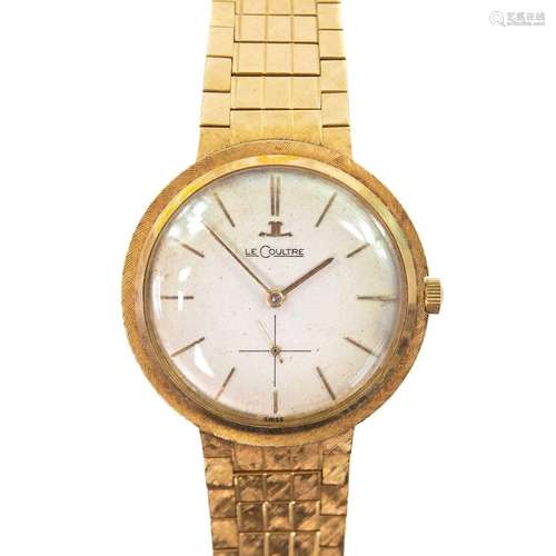 A Le Coultre 14k gold gentleman`s manual wind bracelet wrist...