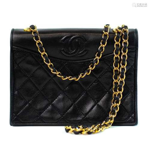 A Chanel Mini Full Flap handbag in black quilted lambskin wi...