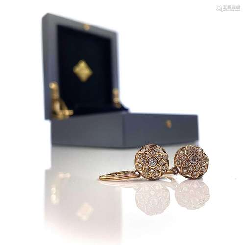 A pair 18ct gold and diamond set earrings designed by Kat Fl...