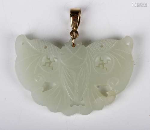 A Chinese pale celadon jade pendant