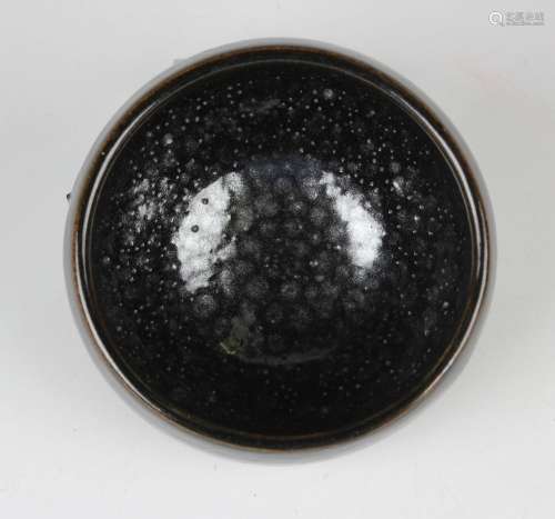 A Chinese dark brown glazed stoneware bowl