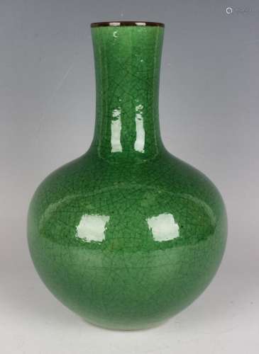 A Chinese apple green crackle glazed porcelain bottle vase w...