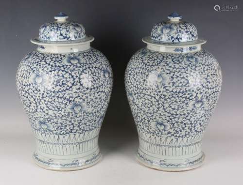 A pair of Chinese blue and white porcelain jars and covers