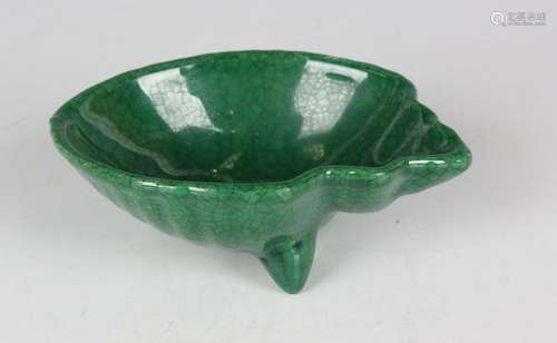 A Chinese apple green crackle glazed porcelain dish in the f...