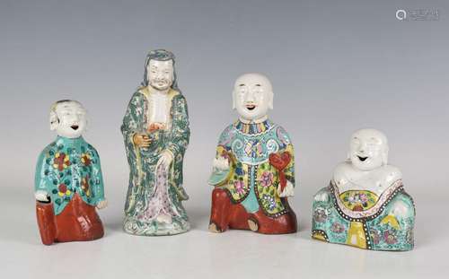 A group of three Chinese famille rose export porcelain figur...