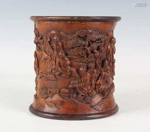 A Chinese carved bamboo brush pot