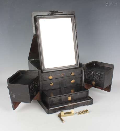 A Chinese brass mounted hardwood rectangular dressing table ...