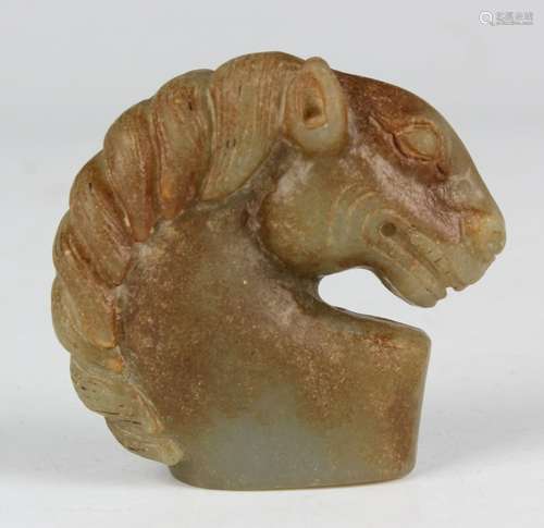 A Chinese carved jade horse's head seal