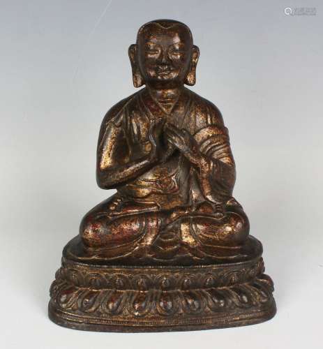 A Sino-Tibetan gilt metal figure of Buddha