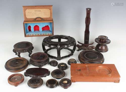 A collection of sixteen Chinese hardwood stands