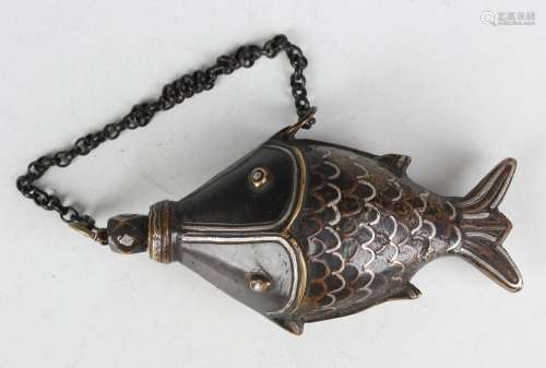 An Islamic silver and copper inlaid bronze bottle and stoppe...