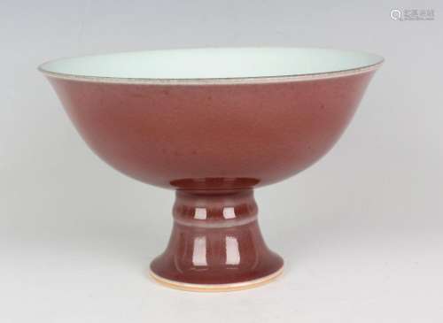 A Chinese sang-de-boeuf glazed porcelain footed bowl